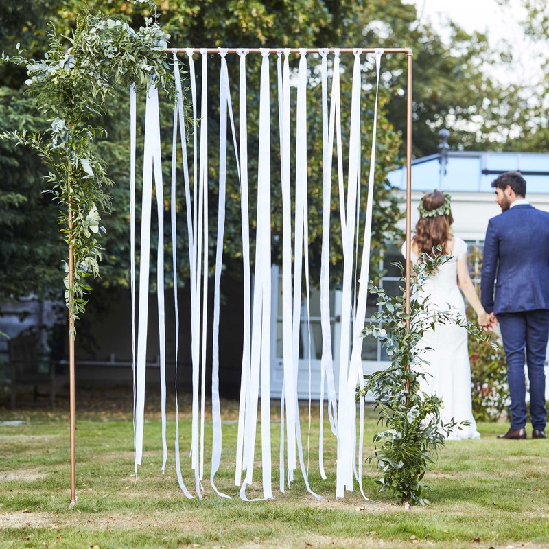 White Ribbon Hanging Wedding Backdrop
