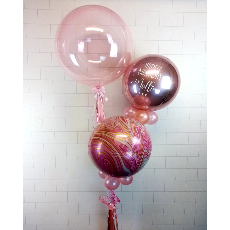 COLLECTION ONLY - Luxe Orbz & Clearz Bouquet- Personalised Rose Gold Orbz Balloon dressed with a Balloon Collar, Marble Orbz dressed with a Balloon Collar & Pink Clearz Balloon dressed with a Tassel & Bow finished with Ribbons & Pink Butterfly